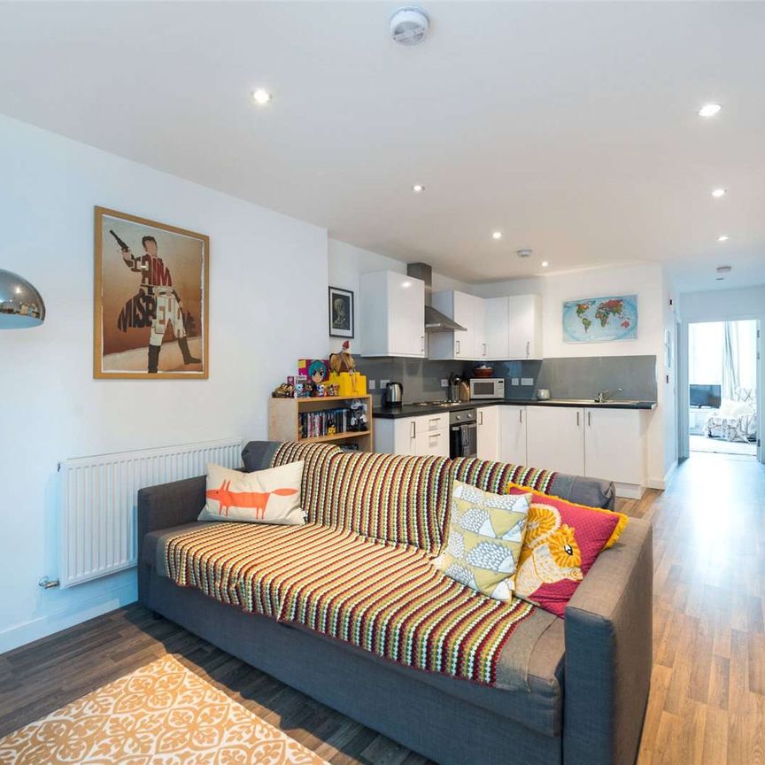 A modern ground floor unfurnished one bedroom flat located in the popular residential location of Leith to the north of central Edinburgh. - Photo 1