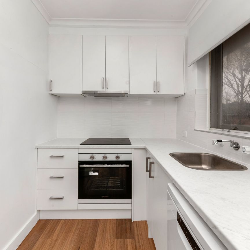 Step into this Beautifully Updated First-Floor Flat! - Photo 1