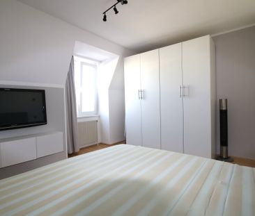 Moderne 3-Zimmer-Wohnung im Dachgeschoss mit Tiefgaragenplatz - Photo 5