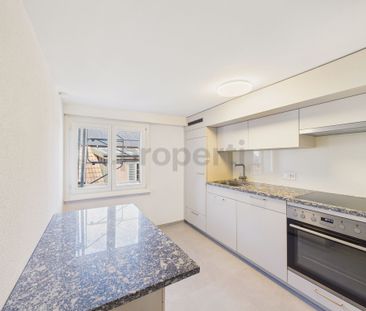 Modern 3.5-room penthouse apartment with balcony in Niederurnen - Photo 1