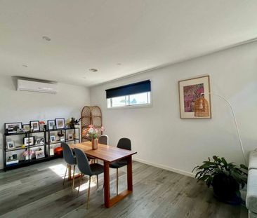 Modern Comfort with Double Garage & Entertaining Deck - Photo 2