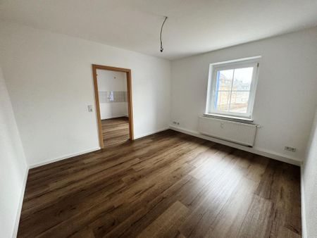 Frisch renovierte 2-Raum-Wohnung mit Gartennutzung - Photo 3