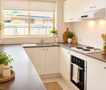 Stylishly Refreshed Townhouse with Unbeatable Convenience - Photo 4