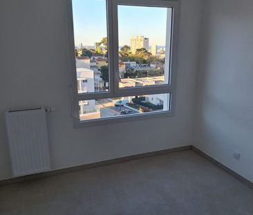 T4 AVEC LOGGIA + PARKINGS - Photo 2