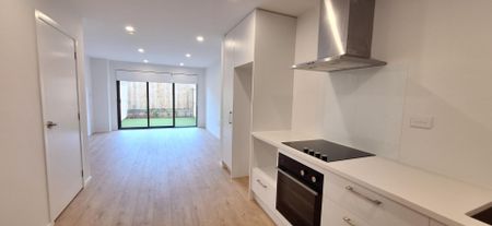 Brand New 2-Bedroom, 2-Bathroom Home with Modern Living Spaces - Photo 5