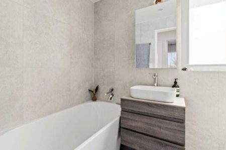Fully Furnished | Stylishly Renovated Three-Bedroom Apartment by Diamond Bay - Photo 5