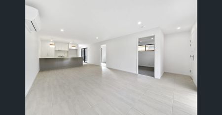 WELL-DESIGNED MODERN FAMILY HOME IN SOUGHT AFTER RIPLEY - Photo 3