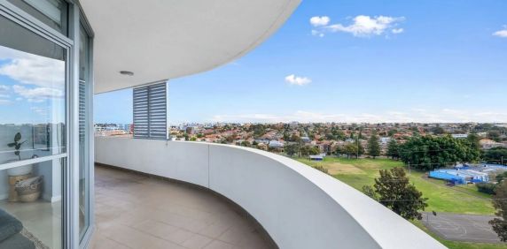 Sun-Drenched Sixth-Floor Living with an Expansive Wraparound Balcony - Photo 2