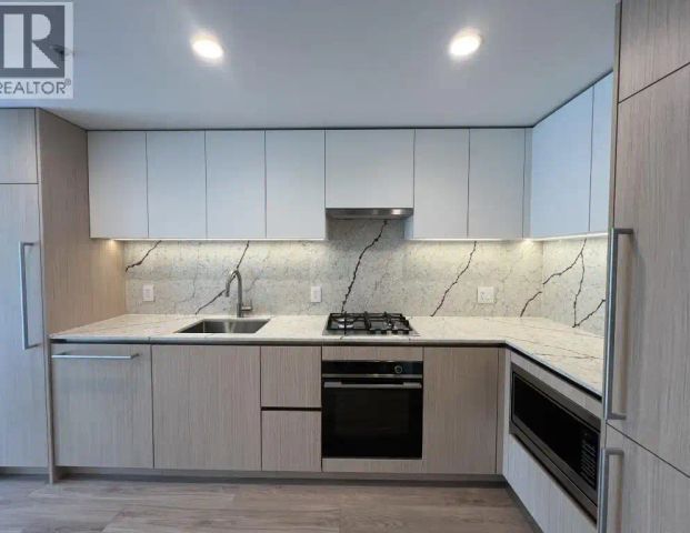 409 2135 SPRINGER AVENUE — 1 Bedroom - Photo 1