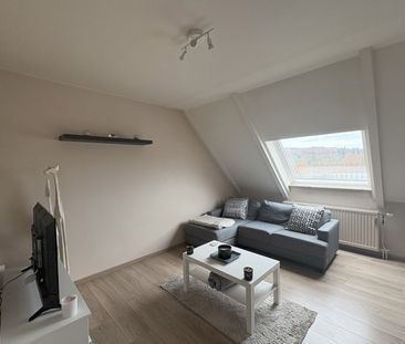 Appartement gelegen op de vierde verdieping met staanplaats - Photo 3