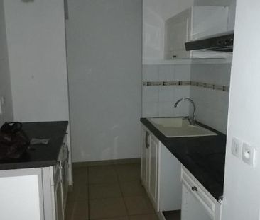 Location Appartement 2 pièces 43m² LA POSSESSION 97419 - Photo 4