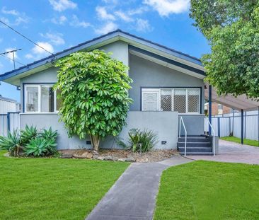 RENOVATED FOUR BEDROOM HOME! - Photo 6