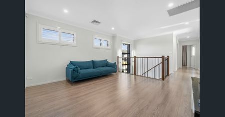 Modern Five-Bedroom Family Home with Spacious Living & Outdoor Entertaining - Photo 2