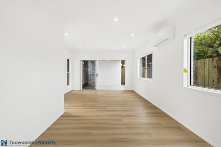 Modern Three-Bedroom Living in a Peaceful Setting - Photo 2