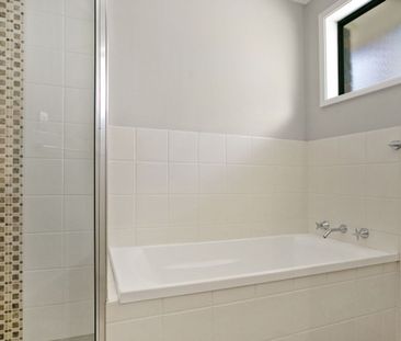 A Beautifully Designed Family Home with Space & Style! - Photo 5