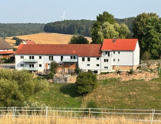 Moderne 2-Zimmer-Erdgeschosswohnung mit Balkon & Erstbezug - Foto 1