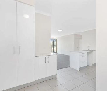 “MODERN APARTMENT STYLE LIVING WITH ENORMOUS BALCONY SPACE” - Photo 1