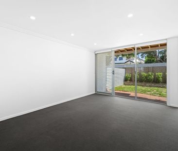 Updated townhouse in high sought after location - Photo 1