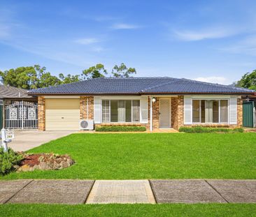 Spacious 4-Bedroom Family Home with a Spacious Sunroom & Large Outd... - Photo 6