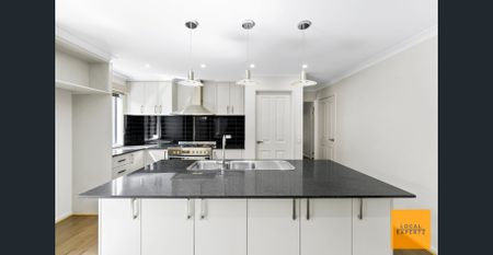 SPECTACULAR FOUR BEDROOM IN A DESIRABLE LOCATION! - Photo 2