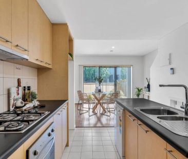 Modern 3-Bedroom Townhouse in the Heart of Mawson Lakes - Photo 6