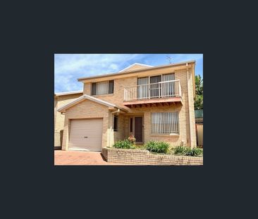 Beautifully Maintained 2-Bedroom Townhouse in a Peaceful Complex - Photo 4