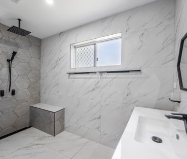 Charming Renovated Home with Shed - Photo 4