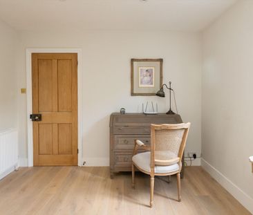 ** SOLE AGENT** An impressive four bedroom semi-detached house with exceptional views, overlooking the Surrey Hills. - Photo 4