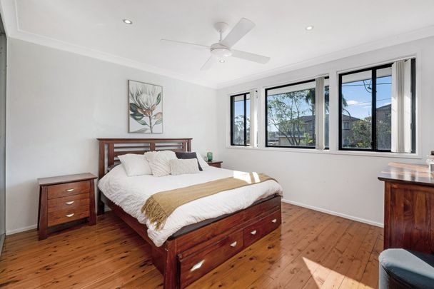 Renovated, Sun-Lit and Spacious Three Bedroom Home - Photo 1