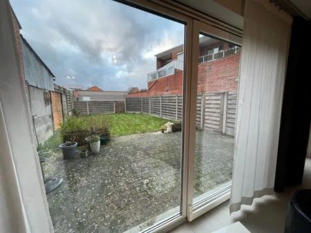 Sfeervol gelijkvloers appartement met 2 slaapkamers, terras en tuin nabij centrum Geel! - Photo 4