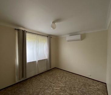 Well-Maintained Two-Storey Unit in Secure, Central Complex - Photo 3