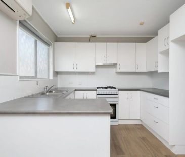 Spacious Dual-Level Home with Pool & Shed in Prime Location - Photo 4