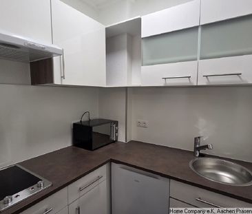 Zentrum: 1-Zi.-App. mit Einbauküche in ruhiger Lage, mit Hofbenutzung - Photo 3