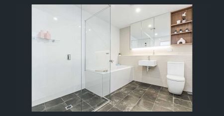 Luxurious Top-Floor Apartment with Unmatched Style and Convenience - Photo 5