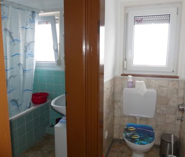 Ihr neues Zuhause: Gemütliche 3-Zimmer-Dachgeschosswohnung in guter... - Foto 1