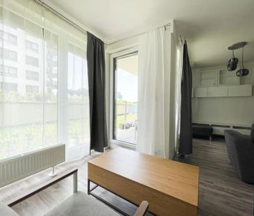Pronájem moderního bytu 1+kk s odděleným spacím koutem, předzahrádk... - Fotografie 1