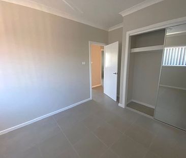 CENTURALLY LOCATED - Photo 1