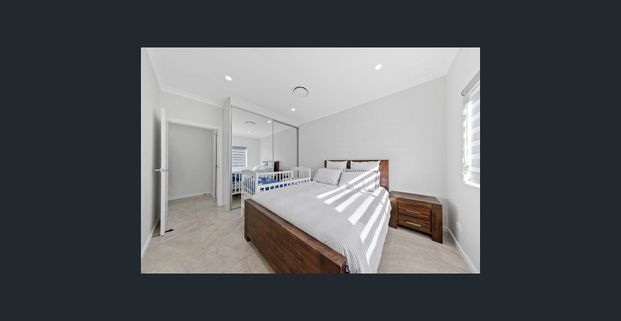 Modern Family Home with Outdoor Entertaining Patio - Photo 1