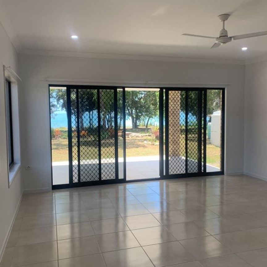 Modern home with waterfront views - Photo 1