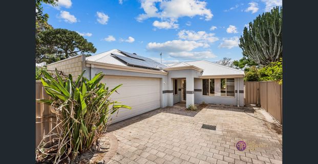 Spacious Home with Theatre Room and Easy-to-Maintain Gardens - Photo 1