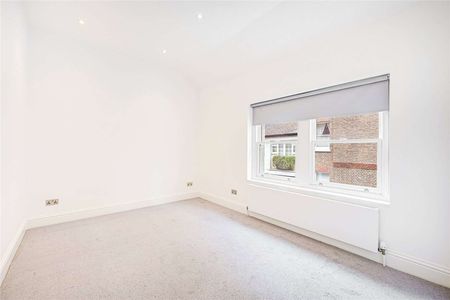 This unique house is set in the heart of Knightsbridge and features two well-appointed bedrooms, two bathrooms, a contemporary and spacious eat-in kitchen, and a separate reception room. - Photo 3