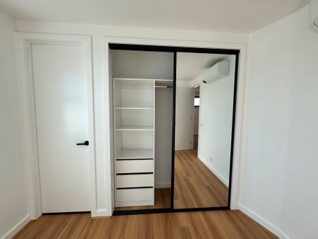 Brand New - Modern Two-Bedroom Townhouse in Prime Reservoir Location - Photo 3