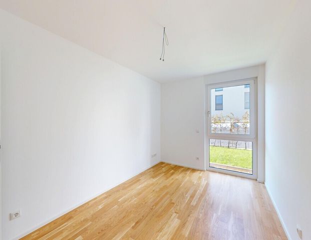 Neubau-Erstbezug: Attraktive Wohnung mit kleinem Garten und sonnigem Balkon! - Foto 1