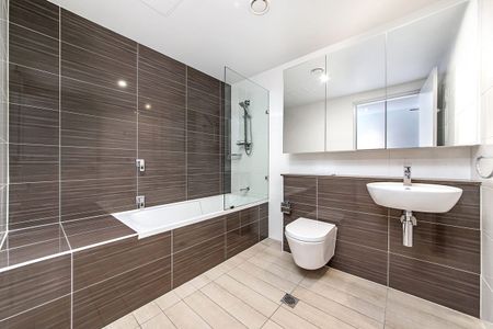 North Facing As New One Bed Apartment with Gym and Pool - Photo 4