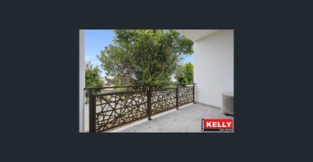 Modern One-Bedroom Unit in Highly Sought-After Woodlands - Photo 4