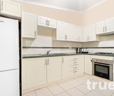 IMPRESSIVE HOME SITUATED IN A SOUGHT-AFTER AREA - Photo 3