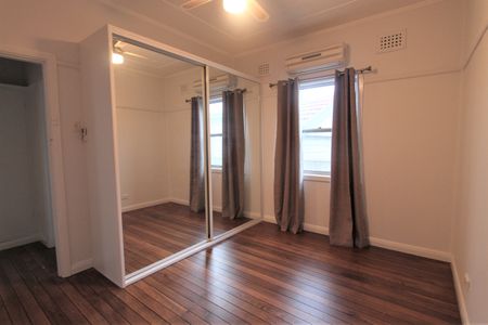 2 Bedroom Home with Sunroom, In A Great Position - Photo 4