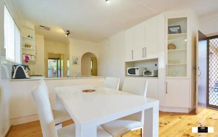 “Welcome to this spacious and secure courtyard homette near the CBD located at the rear of a small group of four.” - Photo 2
