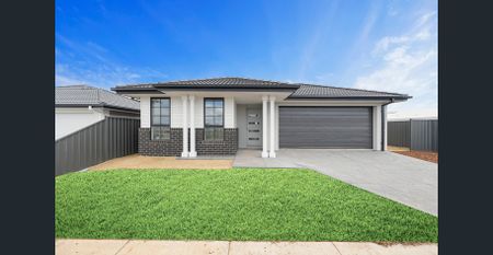 Brand new home, in booming pocket of Lucas! - Photo 3