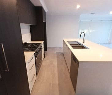 Spacious Brand New Family Home in Sought-After Lakelands - Photo 4